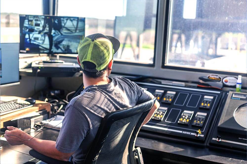 man at a dispatch station