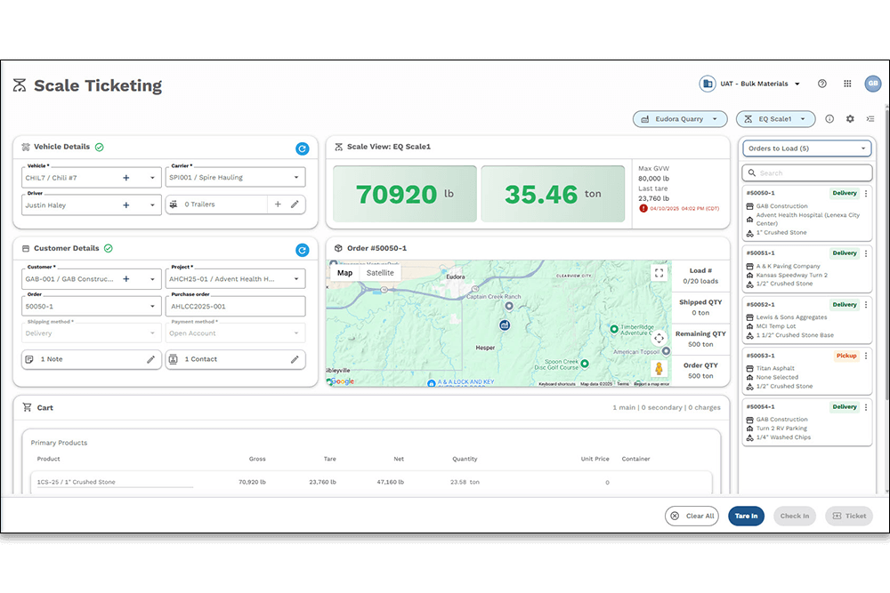 man sitting at desktop computer using apex